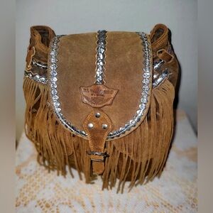 Italian leather fringe bag. Brand NEW. Smoke free home.